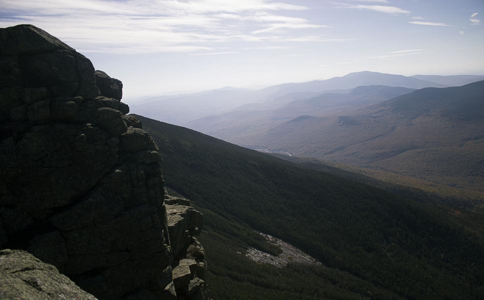 Free Image of Person Standing on Top of a Mountain 