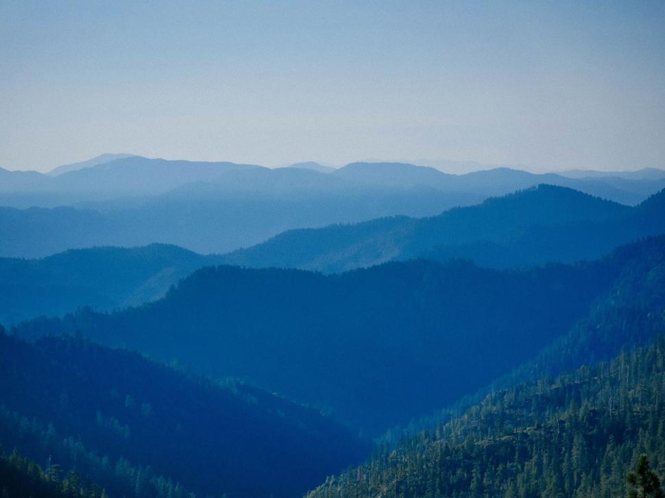 Free Image of Panoramic View of a Distant Mountain Range 
