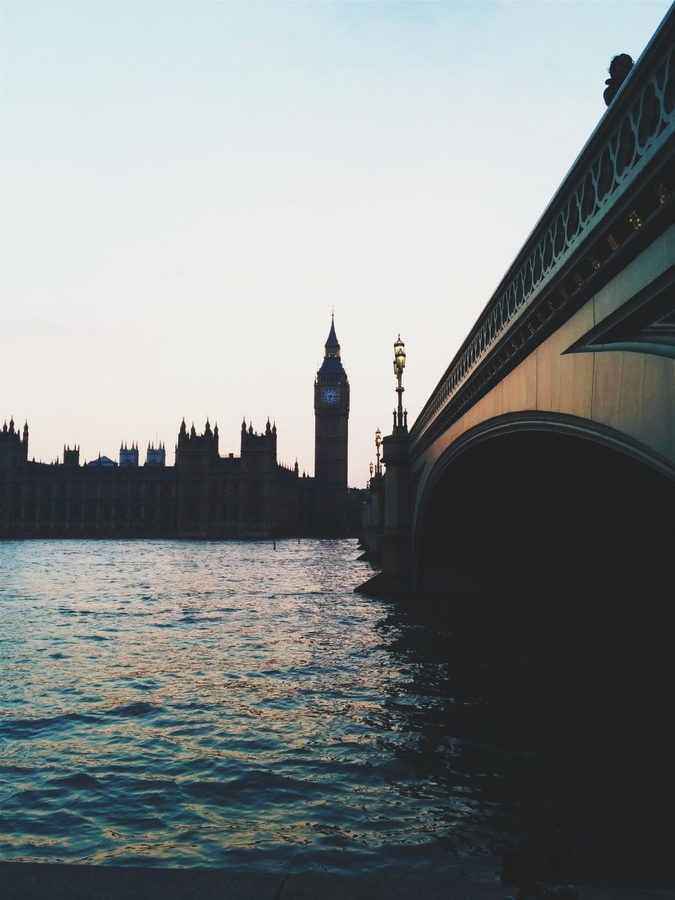 Free Image of Bridge Over Water With Clock Tower 