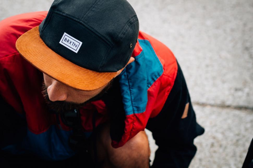 Free Image of Man Wearing Hat and Red Blue Jacket 