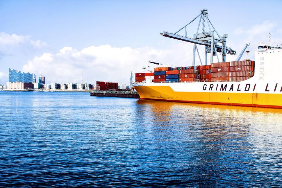 Free Image of Large Cargo Ship Sailing Across Open Water 