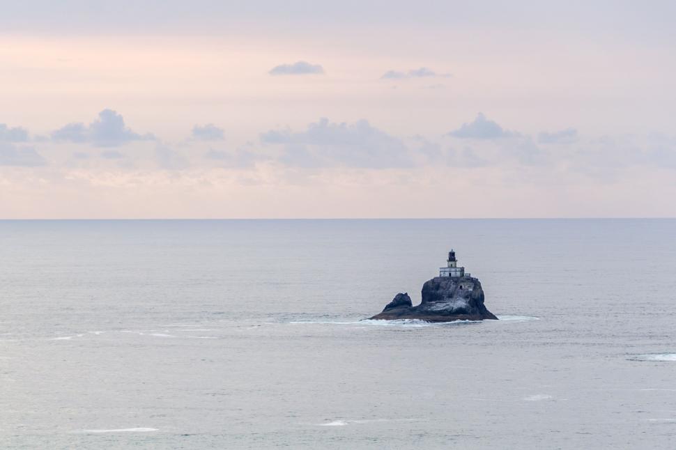 Free Image of Small Boat Adrift on Vast Water 