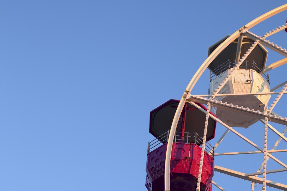 Free Image of Ferris Wheel Against Blue Sky 