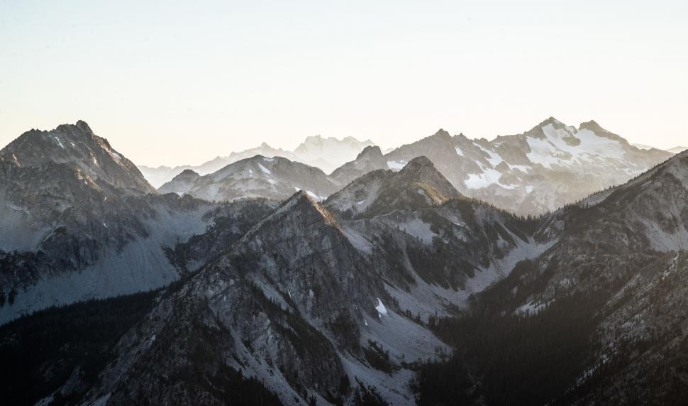 Free Image of Snow Covered Mountain Range in Background 