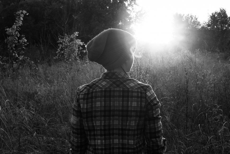 Free Image of Person Standing in Tall Grass Field 