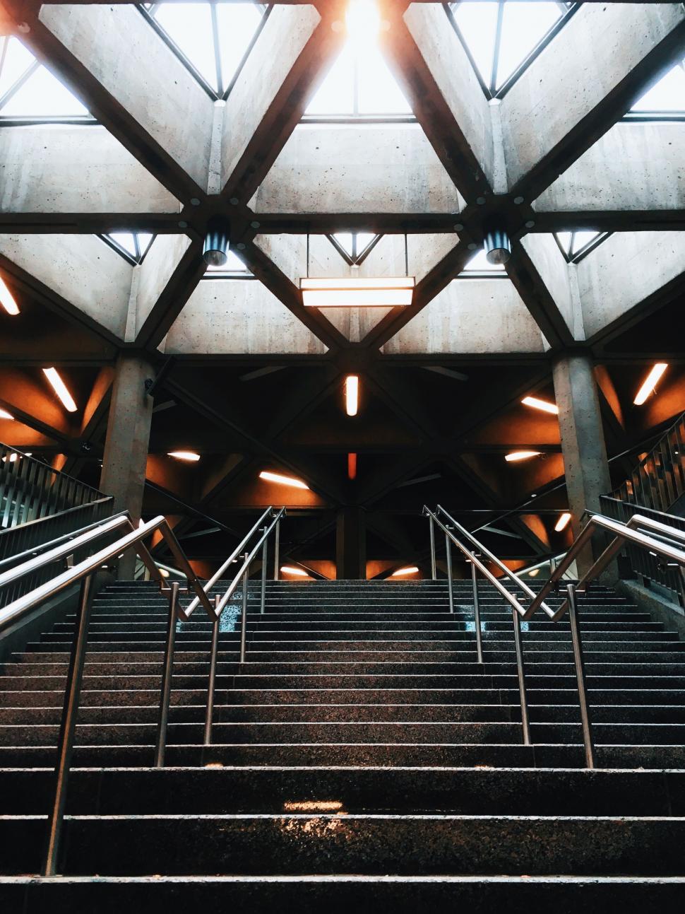 Free Image of Stairs Ascending Towards Skylight 