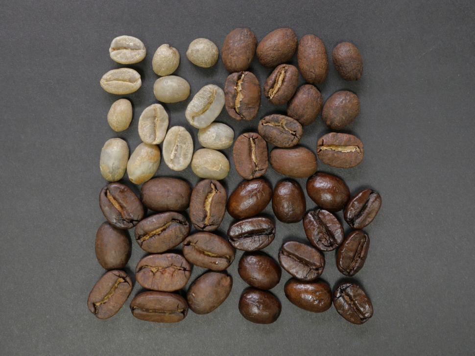 Free Image of A Pile of Coffee Beans on a Table 