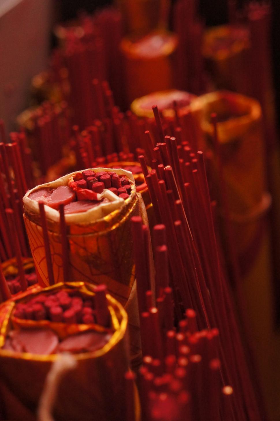 Free Image of Row of Red Candles on Table 