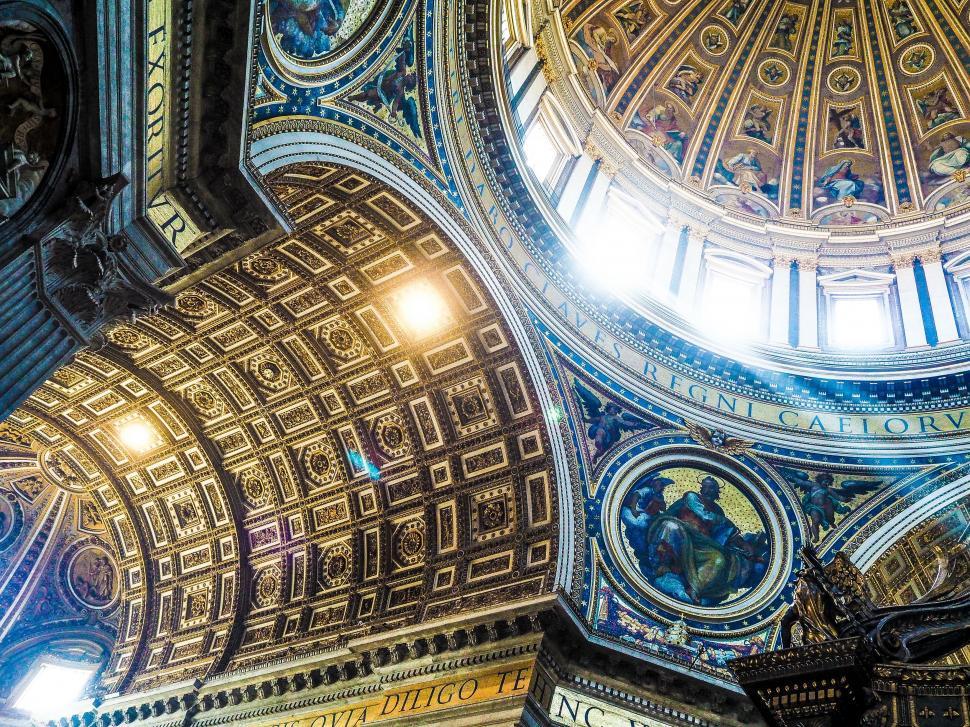 Free Image of Clock Adorning Ceiling of Impressive Building 