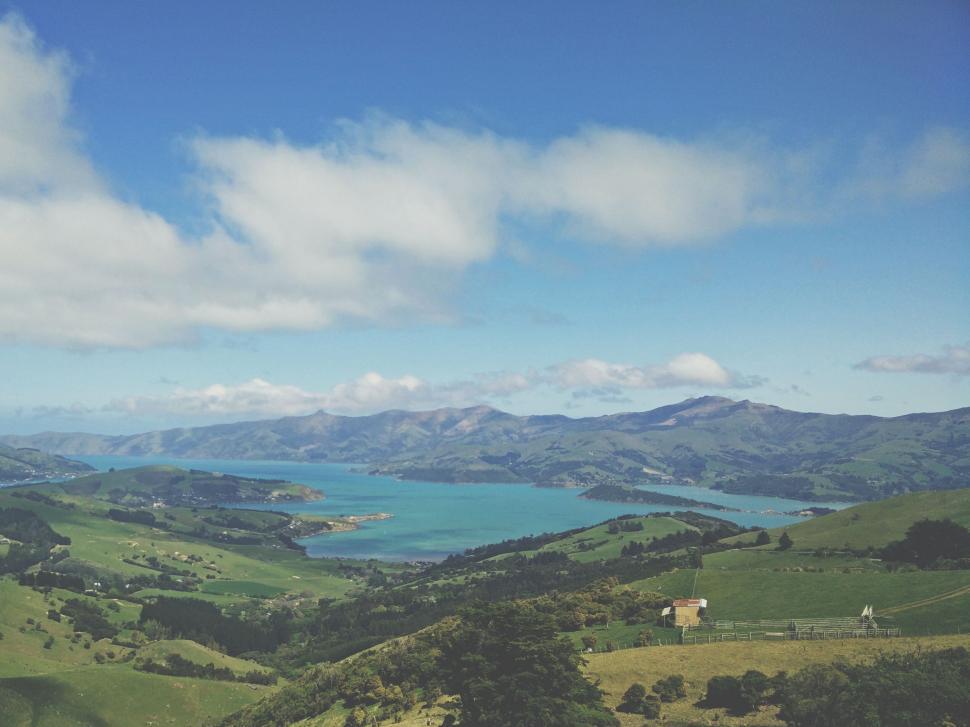 Free Image of Majestic Lake Surrounded by Towering Mountains 