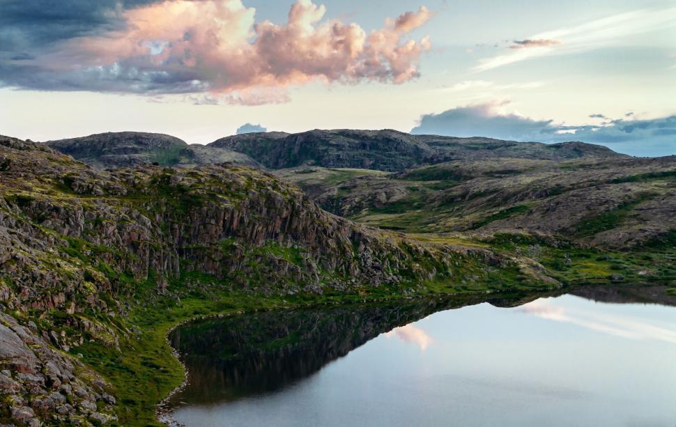 Free Image of Majestic Lake Surrounded by Mountains 