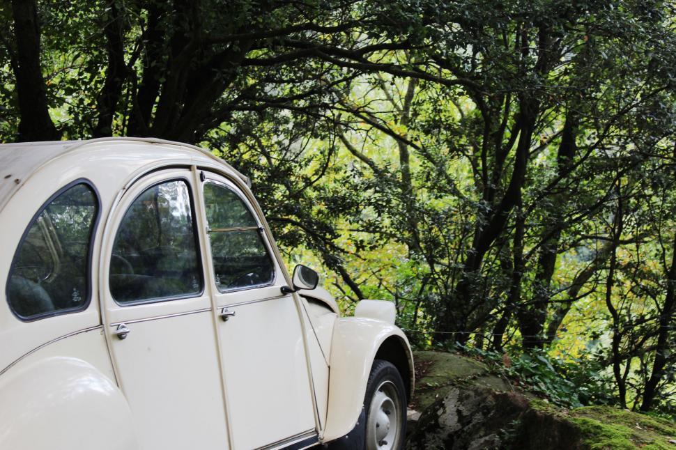 Free Image of White Car Parked on Side of Road 