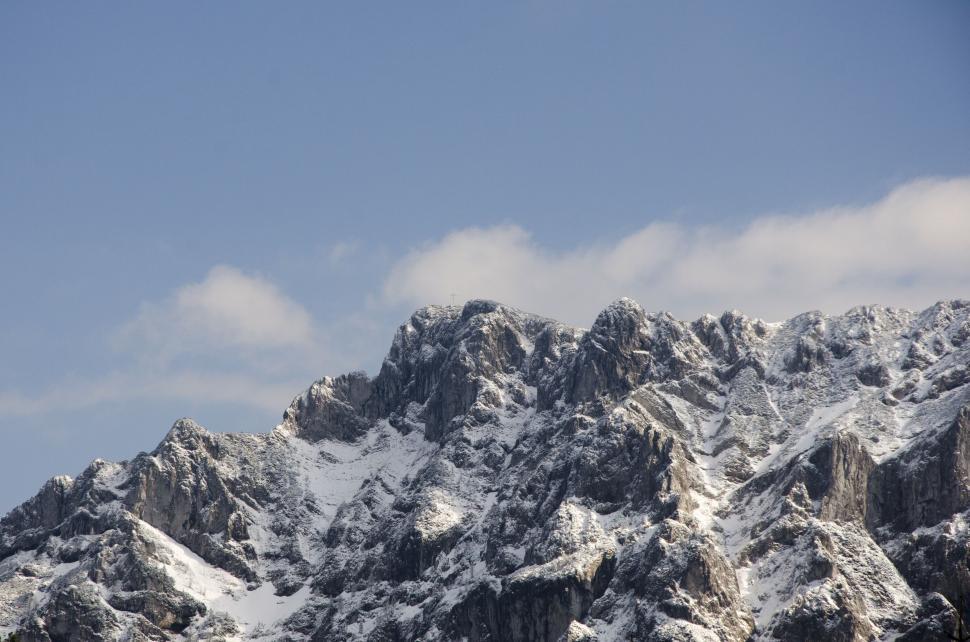 Free Image of Snow Covered Mountain With Ski Lift 