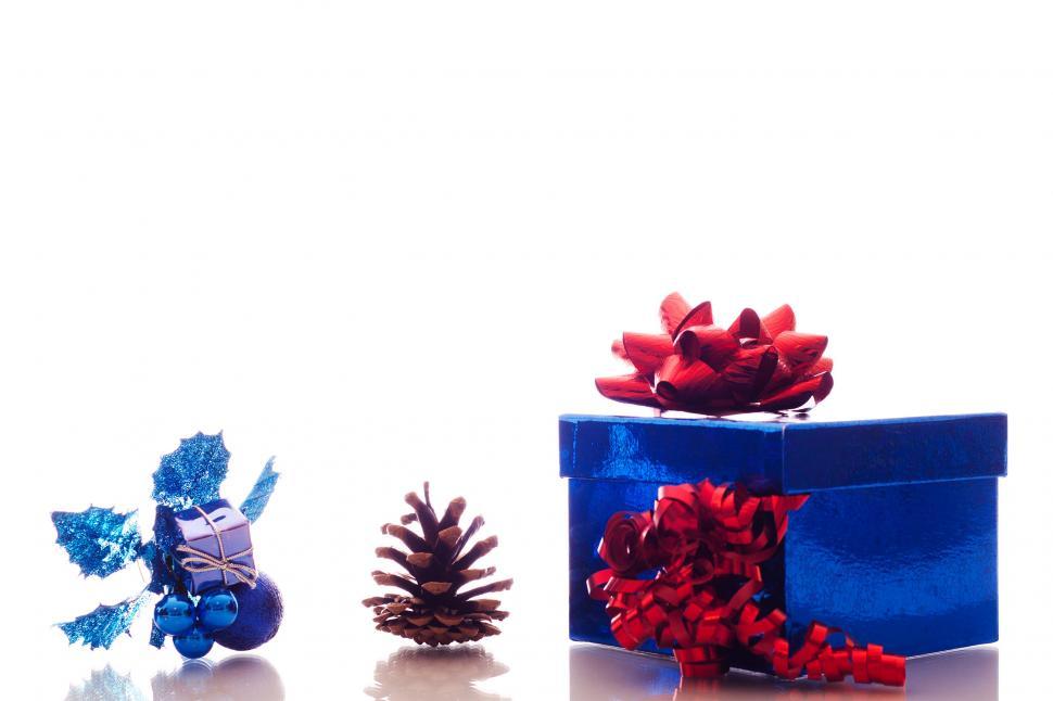 Free Image of Christmas ornaments and gift box on white 