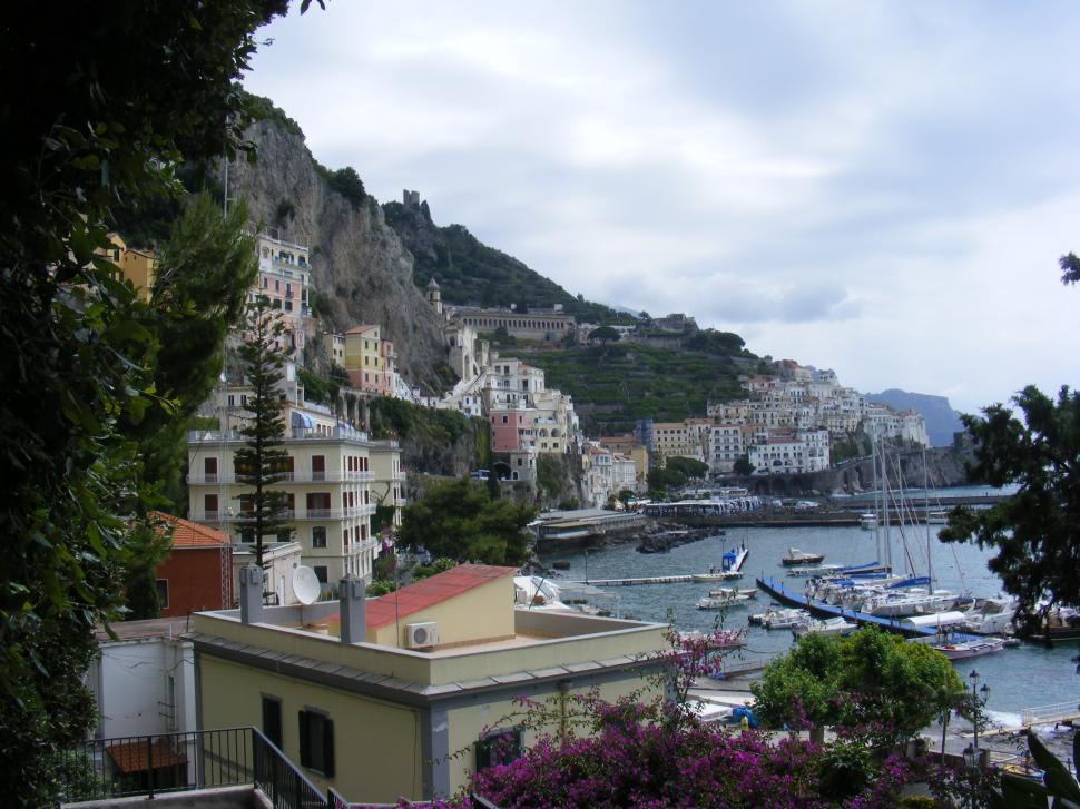 Free Image of Small sailing ships, rocky shore, Italian sea coast  