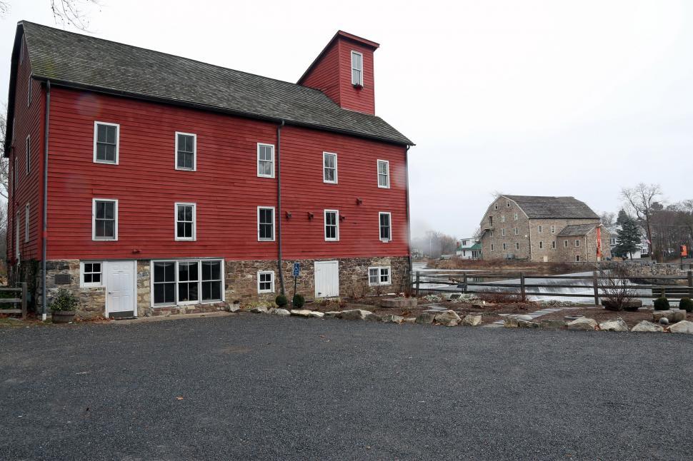 Free Image of Red Mill and Art Museum in the Rain 