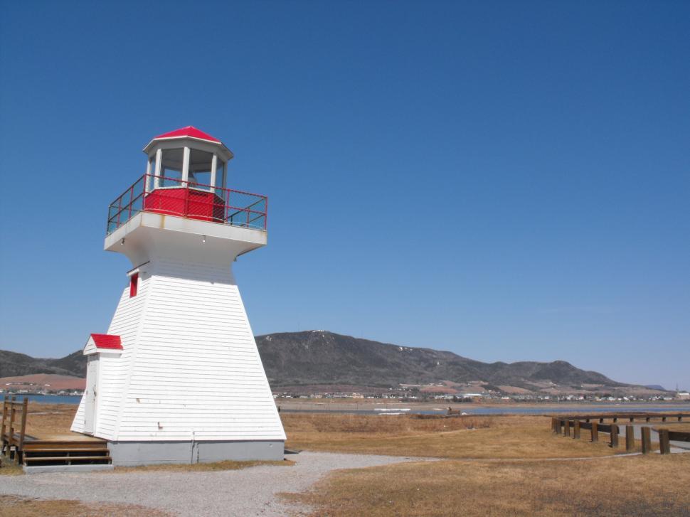 Free Image of Lighthouse on the beach  