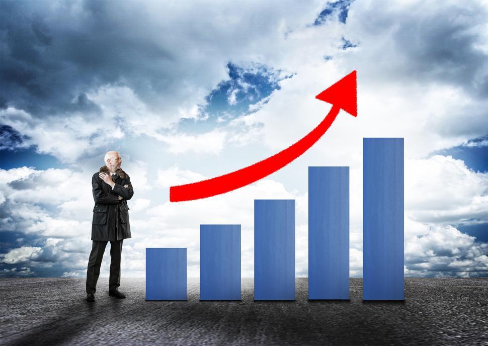 Free Image of Businessman and Bar Chart with Arrow - Money Growth Concept 