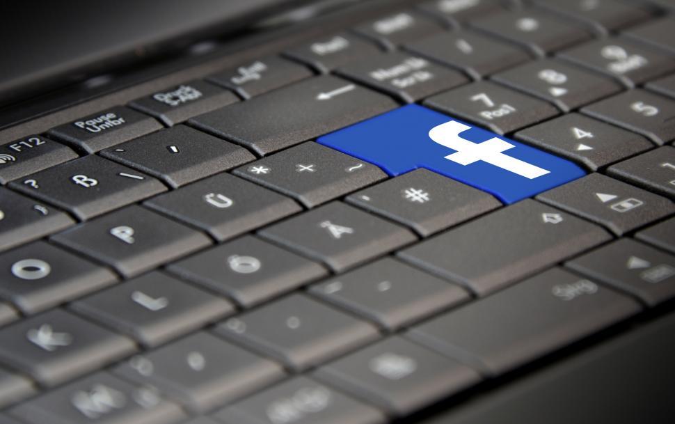 Free Image of Facebook Logo on Laptop Keyboard 