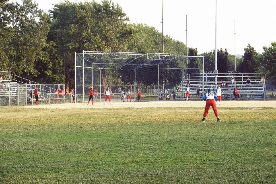 Free Image of Young Men Playing a Game of Baseball 