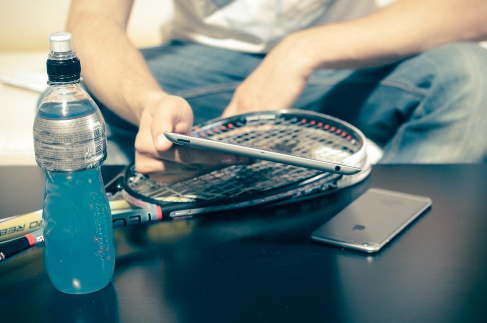 Free Image of Mobile device user after squash 