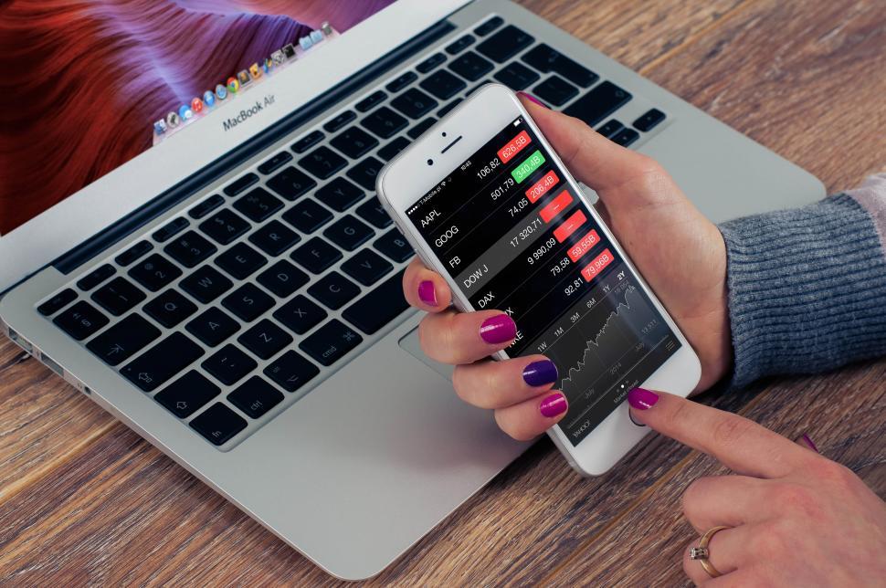 Free Image of Mobile phone monitoring stock portfolio 