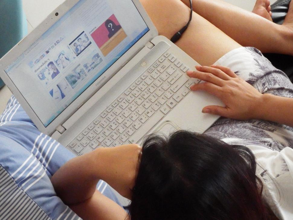 Free Image of Woman Using Laptop on the Sofa  