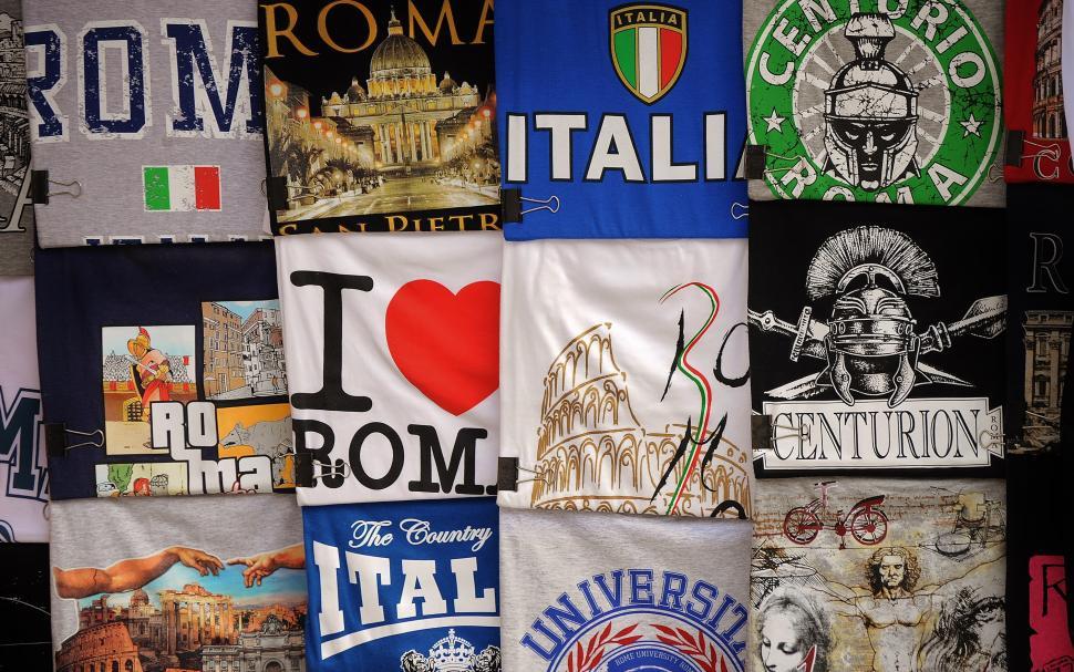 Free Image of Various Types of Shirts Hanging on a Wall 
