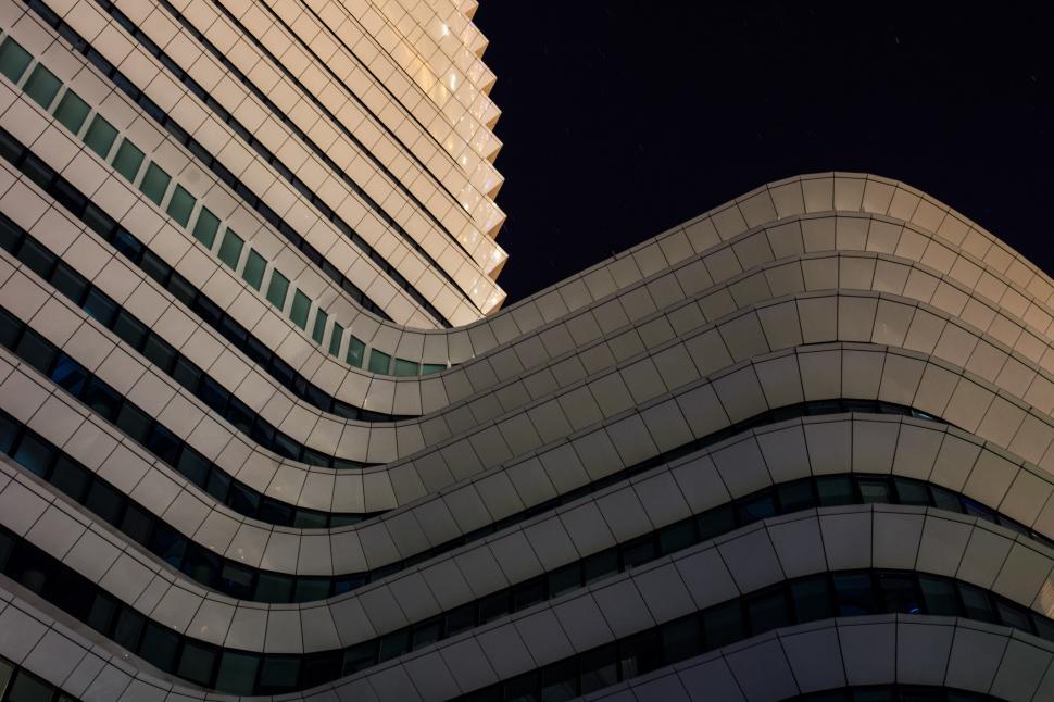 Free Image of Towering Building With Side Clock 