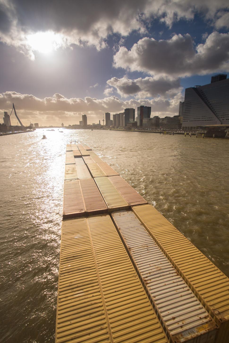 Free Image of Long Wooden Dock in Middle of Body of Water 