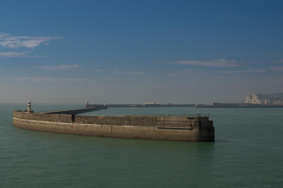 Free Image of Large Boat Floating on Top of Body of Water 