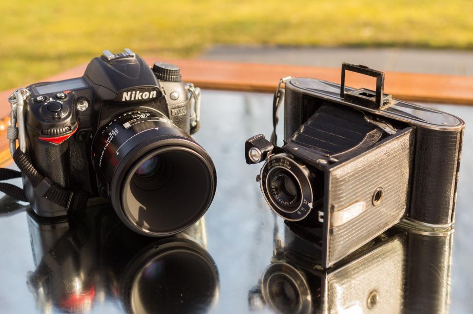 Free Image of Two Cameras on Table 