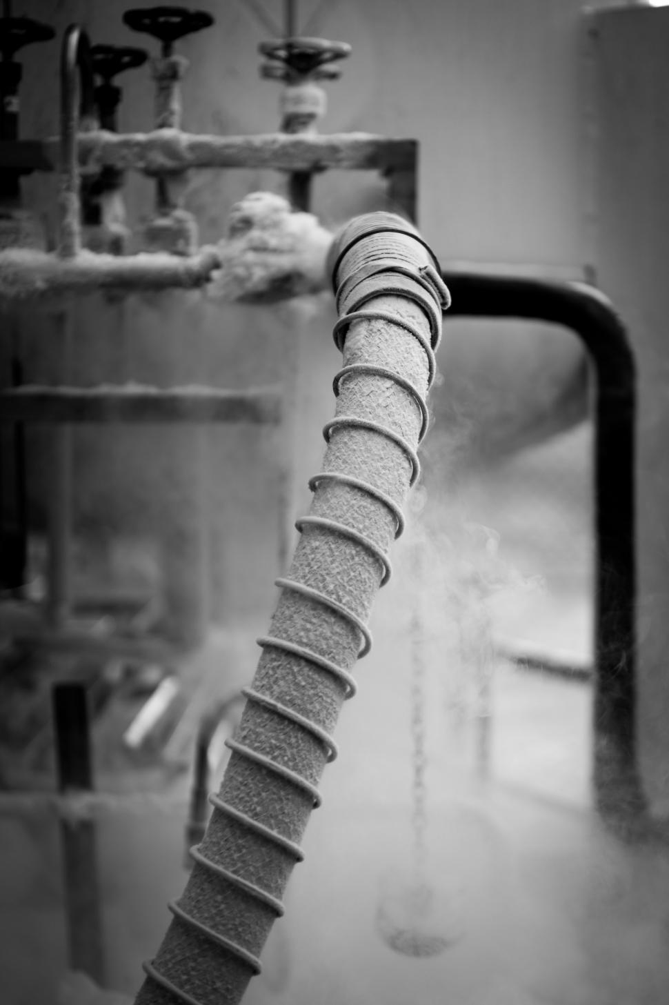 Free Image of Black and White Photo of a Pipe 