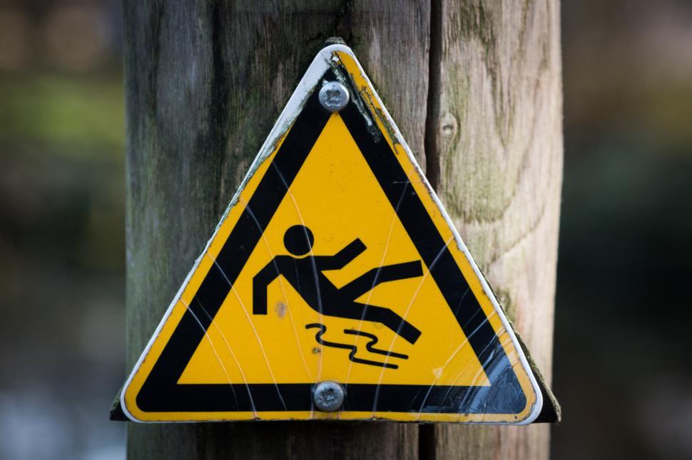 Free Image of Yellow and Black Sign on Pole 
