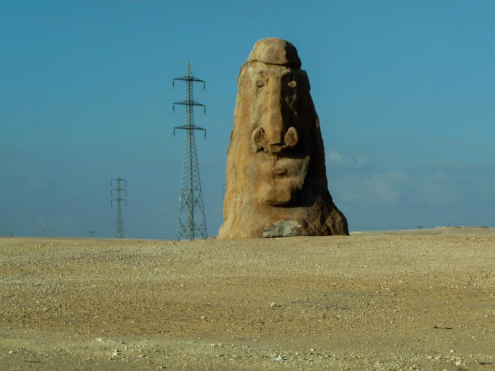 Free Image of Massive Rock Formation in Desert Landscape 