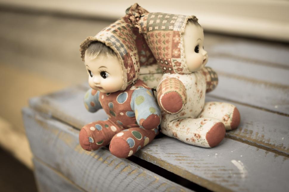 Free Image of Small Teddy Bear on Wooden Bench 