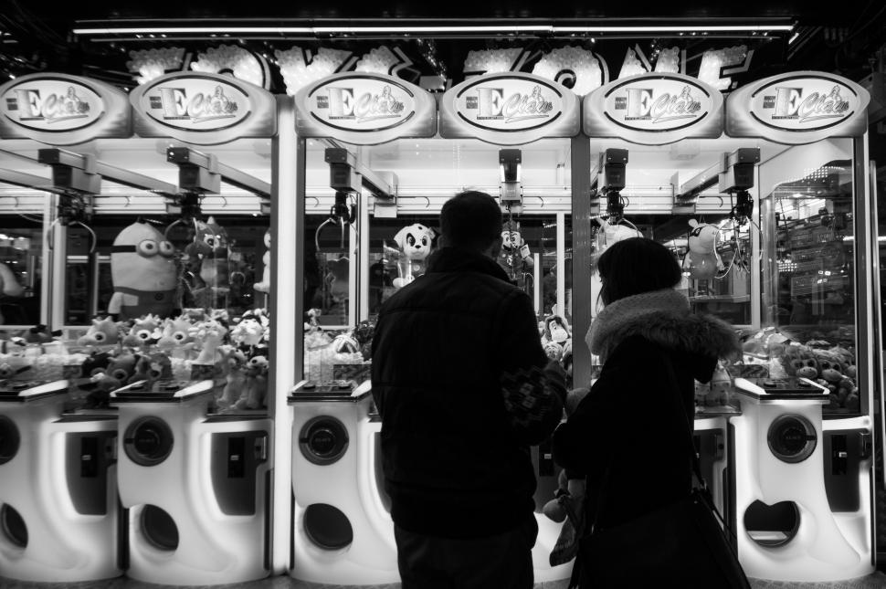 Free Image of People Standing in Front of Vending Machine 