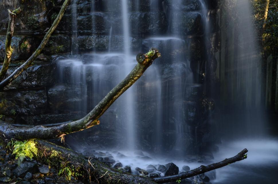 Free Image of Moss-Covered Rocks at Waterfall 