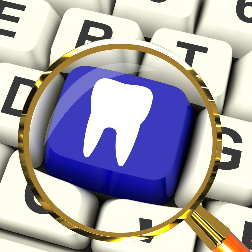Free Image of Tooth Key Magnified Means Dental Appointment Or Teeth 