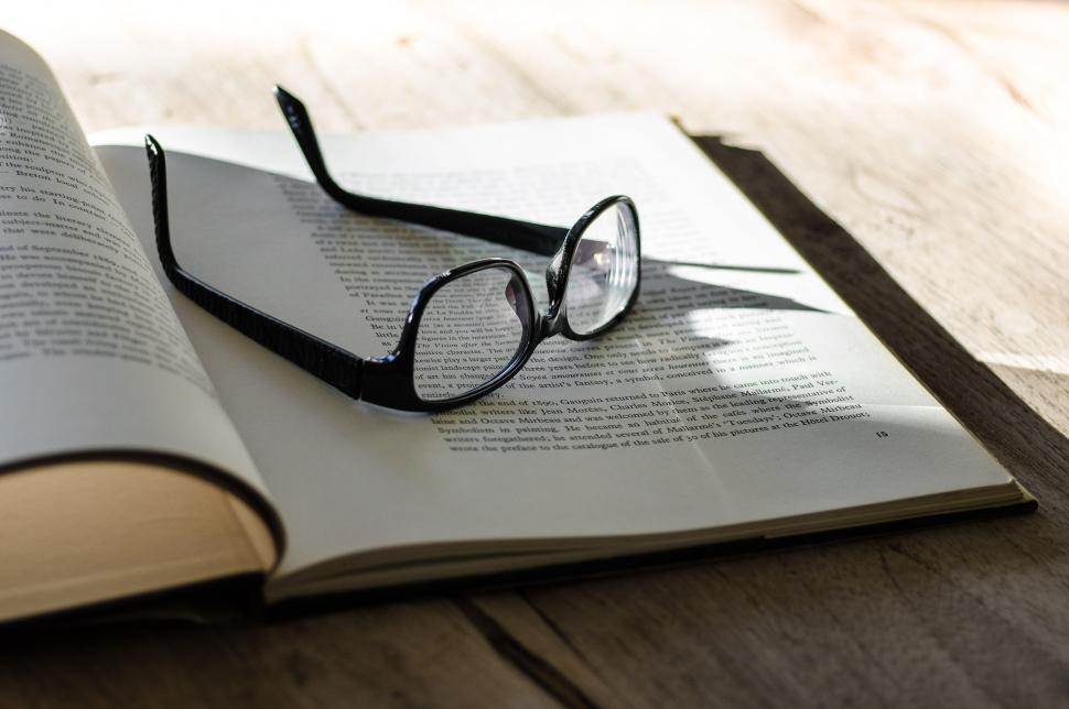Free Image of Open Book With Glasses 