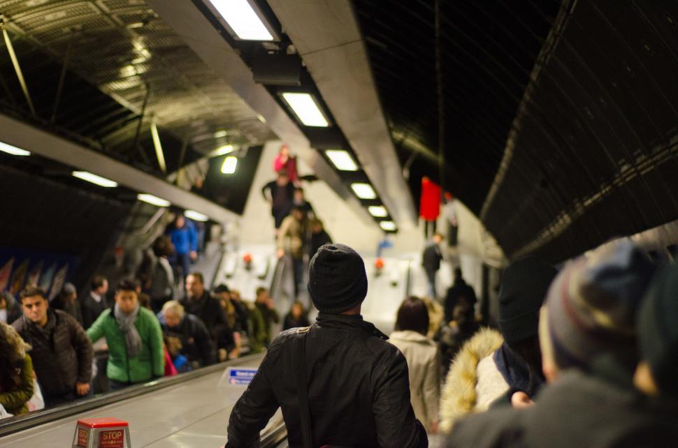 Free Image of Crowd of People Riding an Escalator in a Subway 