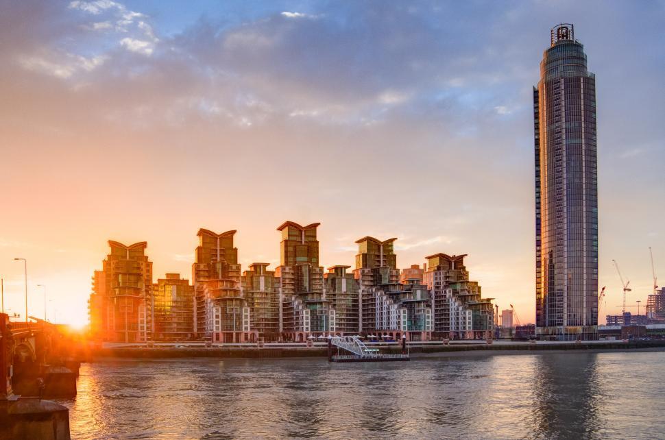 Free Image of Cityscape Overlooking Vast Water Body 