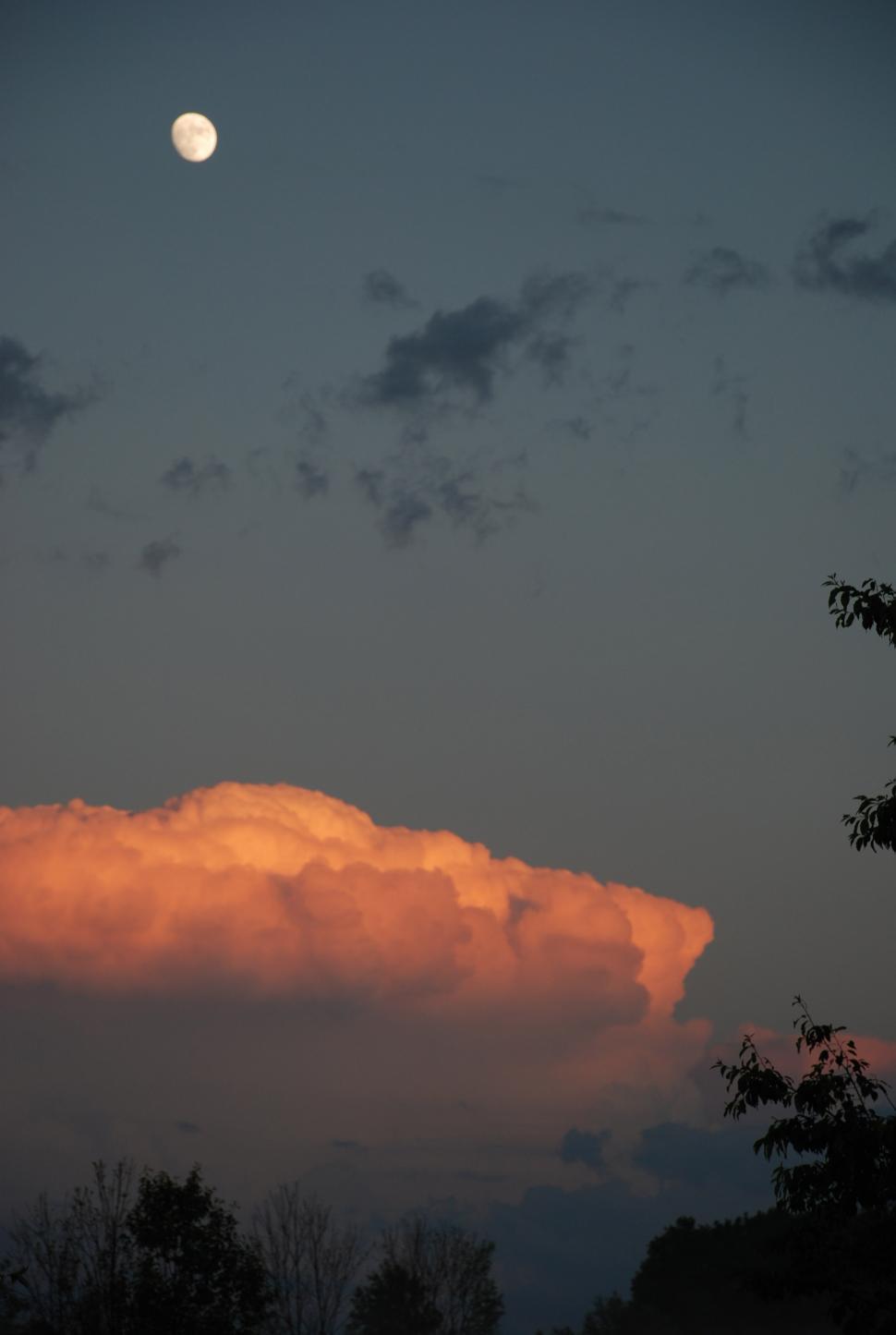 Free Image of Moon Setting Behind Cloud in Sky 