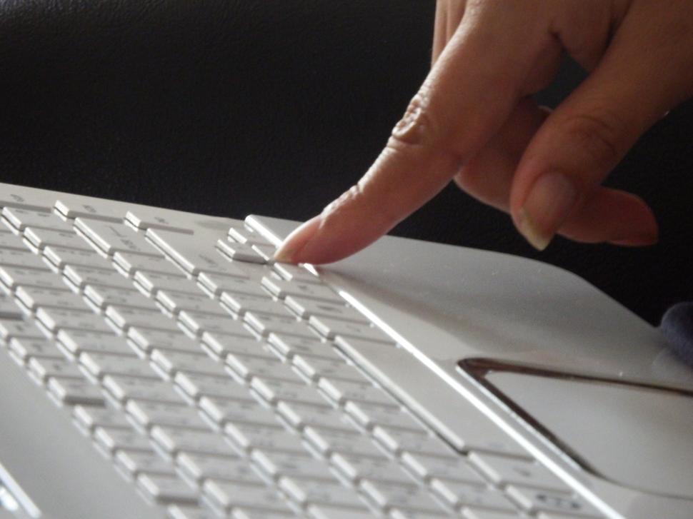 Free Image of Pressing keys on a keyboard  
