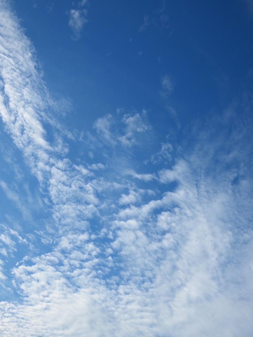 Free Image of Blue Sky and Fluffy White Clouds  