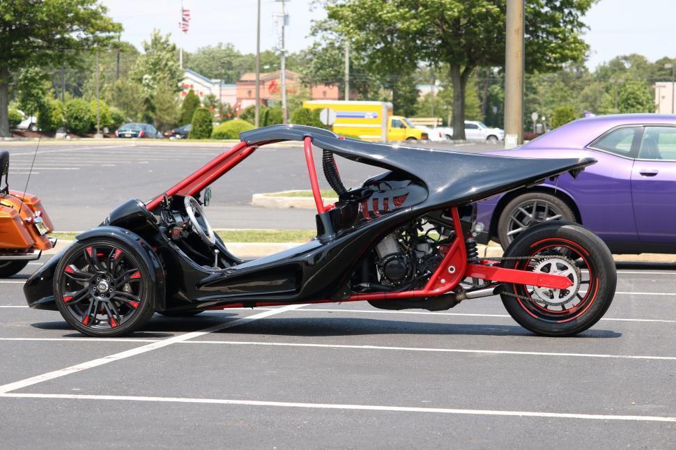 Free Image of Three Wheel Cycle in Parking Lot 