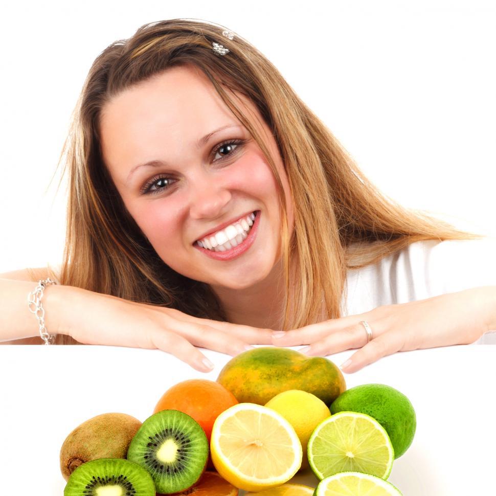 Free Image of Eat More Fruit - Woman and Assorted Fruit 