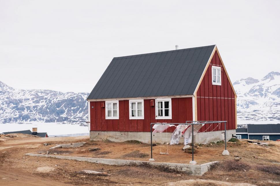 Free Image of Small Red House With Black Roof 