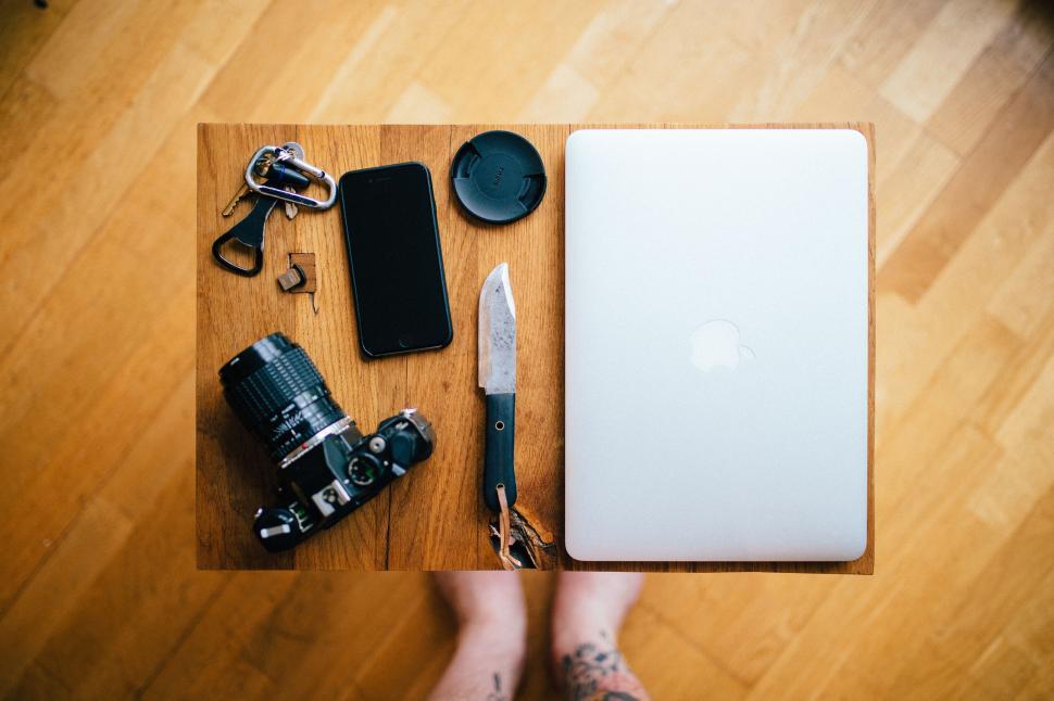 Free Image of Wooden Table With Laptop Computer and Knife 
