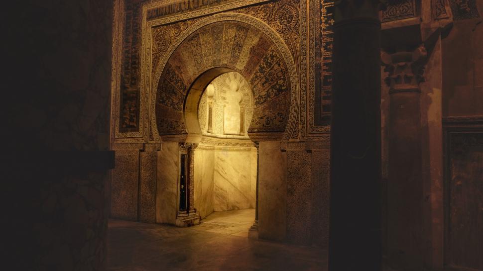Free Image of A Doorway in a Building With a Clock 